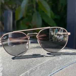 RayBan Aviator Sunglasses. Minor scratches on lenses. Metallic bronze color.